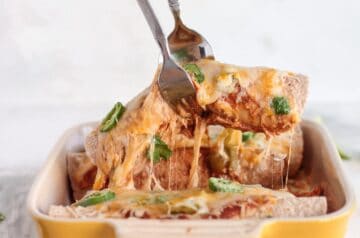 chicken enchilada recipe, Food Images & Pictures Enchilada Fork Hand Utensils Cheese Eat Dish Mexican Food Dinner Lunch Table Human