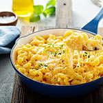 Baked mac and cheese in a cast iron pan