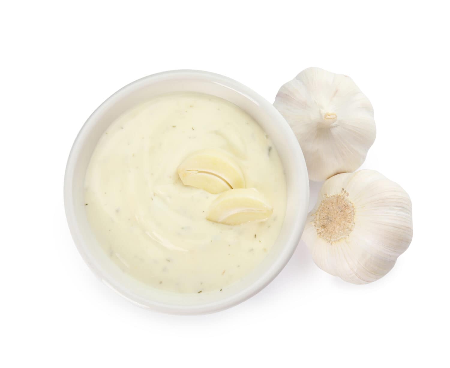 Bowl of homemade sauce and garlic isolated on white, top view
