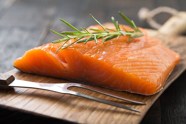smoked salmon on wooden board