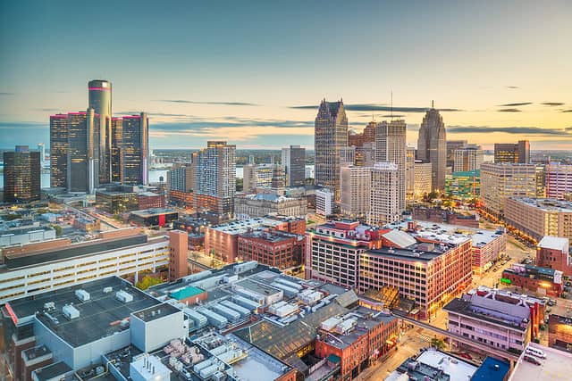 Detroit Michigan USA downtown skyline from above at dusk.